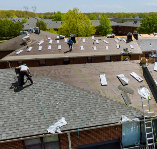 Aerial view of a roof replacement project in progress